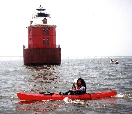 Me on a kayak next to the Sandy Point Shoal Lighthouse in June 1999